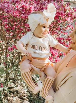 Mini Prep Headband, little girl getting held up by mother